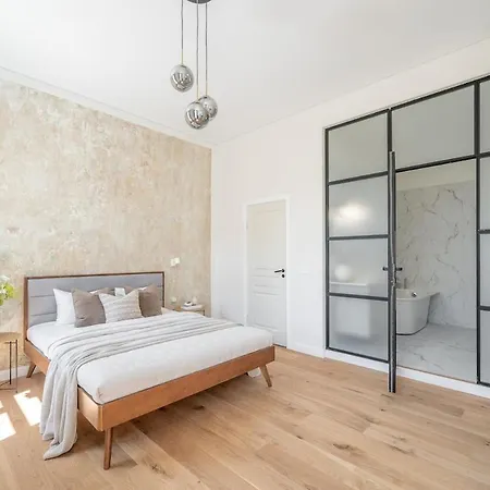 Sunny Garden Street In Vilnius