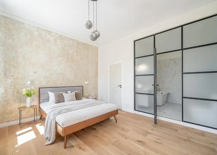 Sunny Garden Street In Vilnius